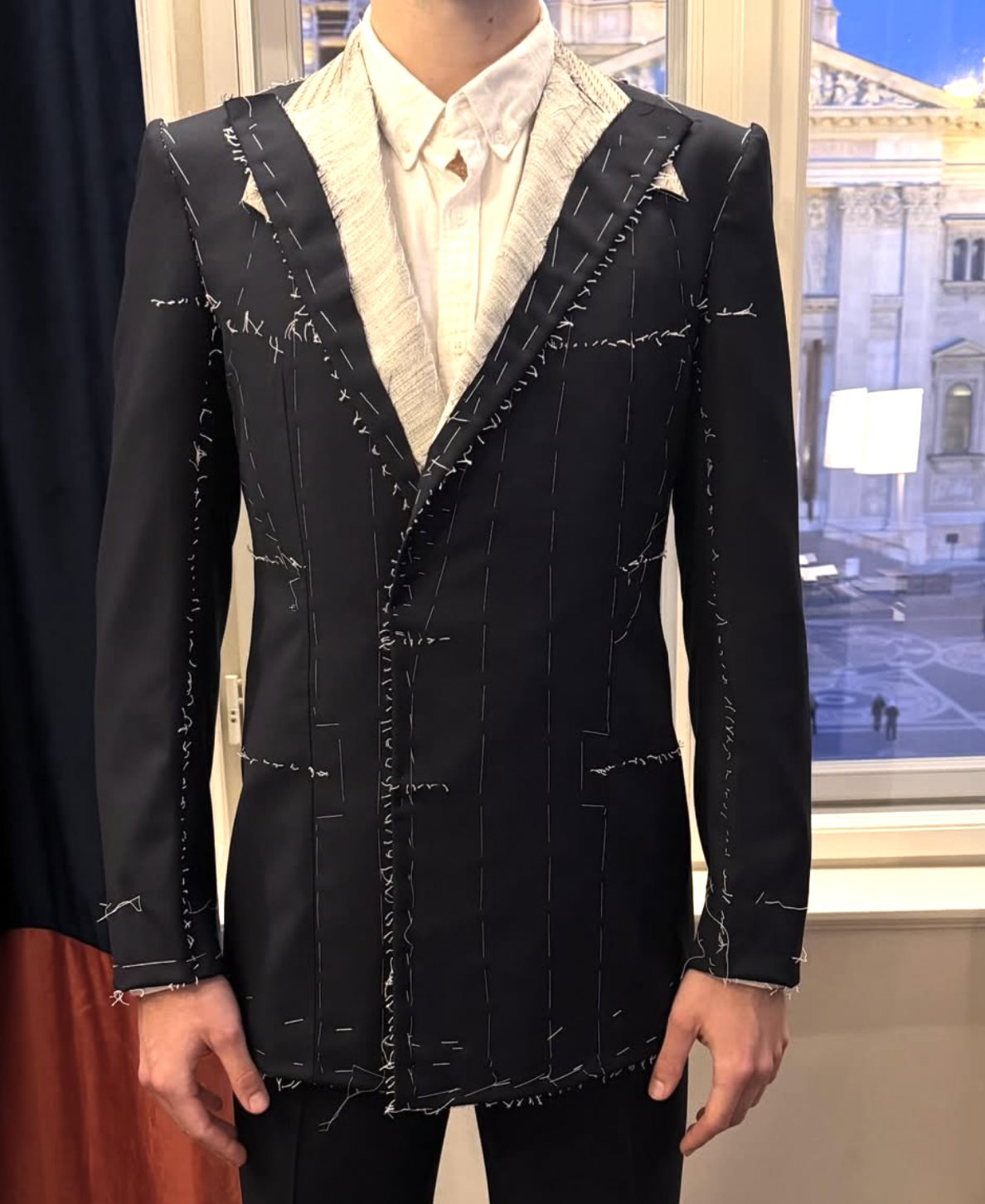 Basted suit at fitting