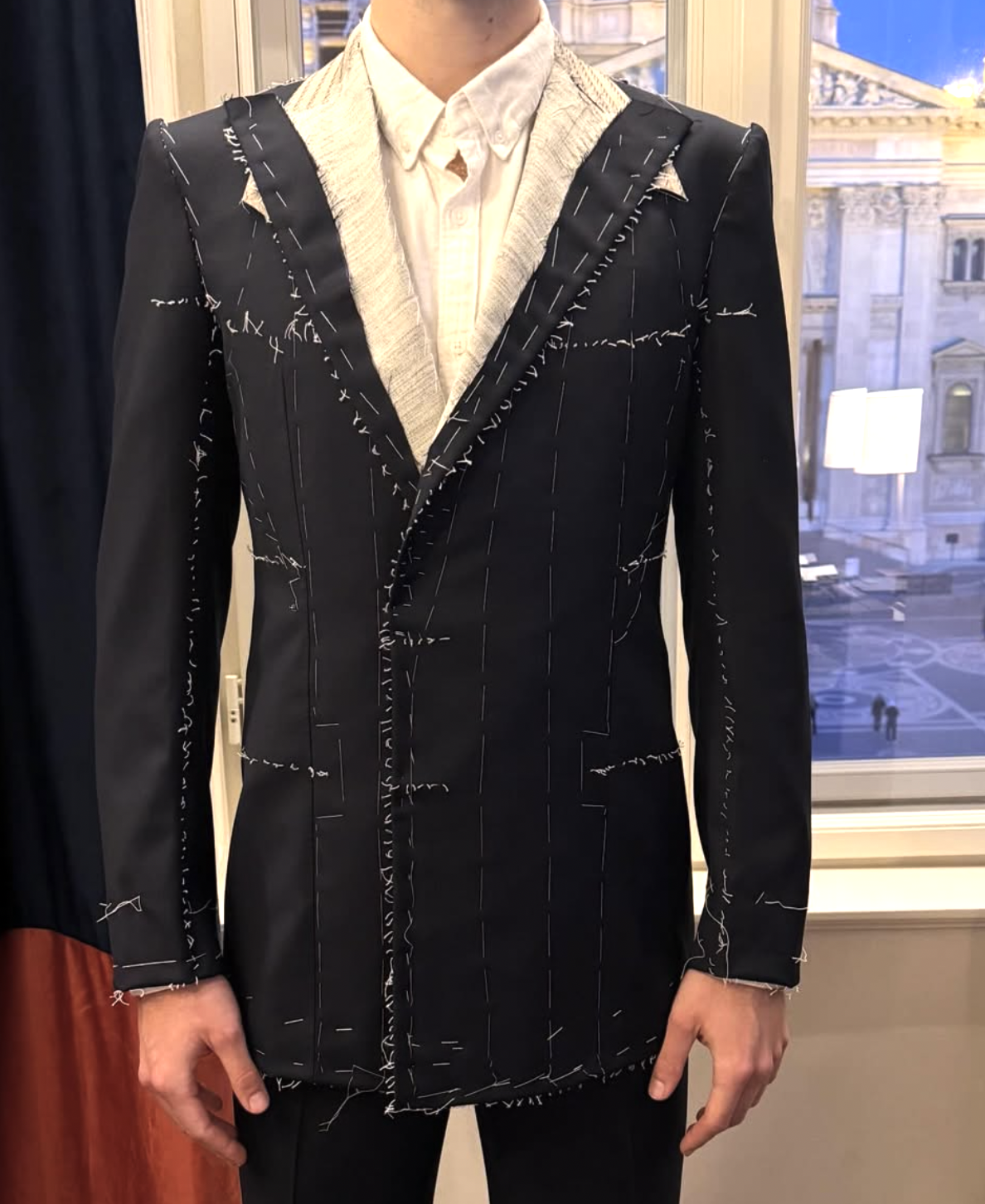 Basted suit at fitting