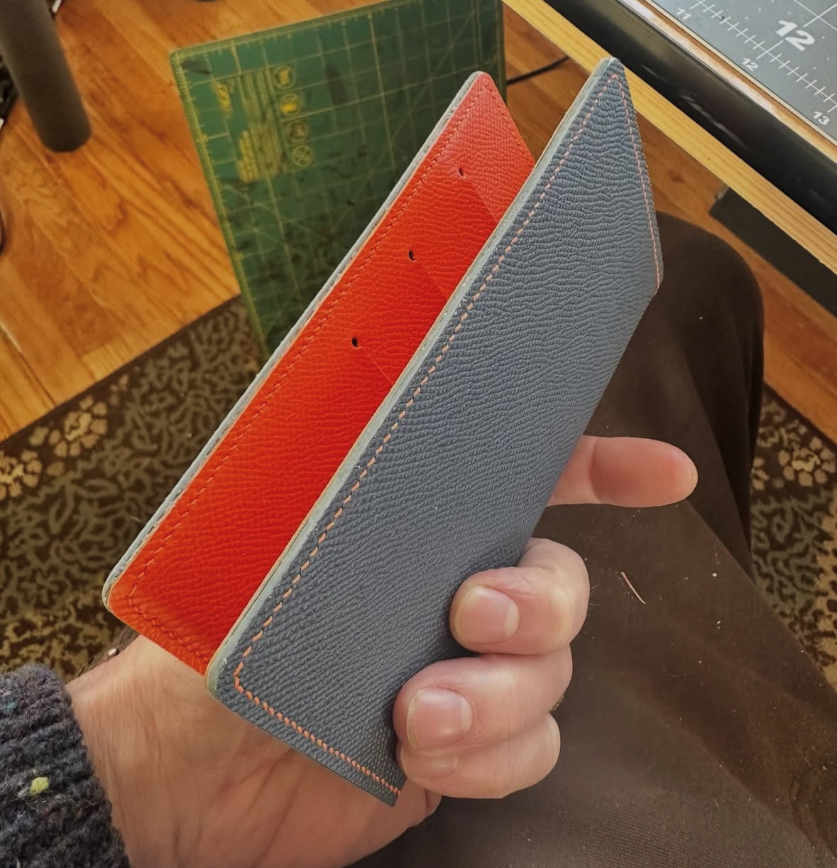 Gray and orange passport cover